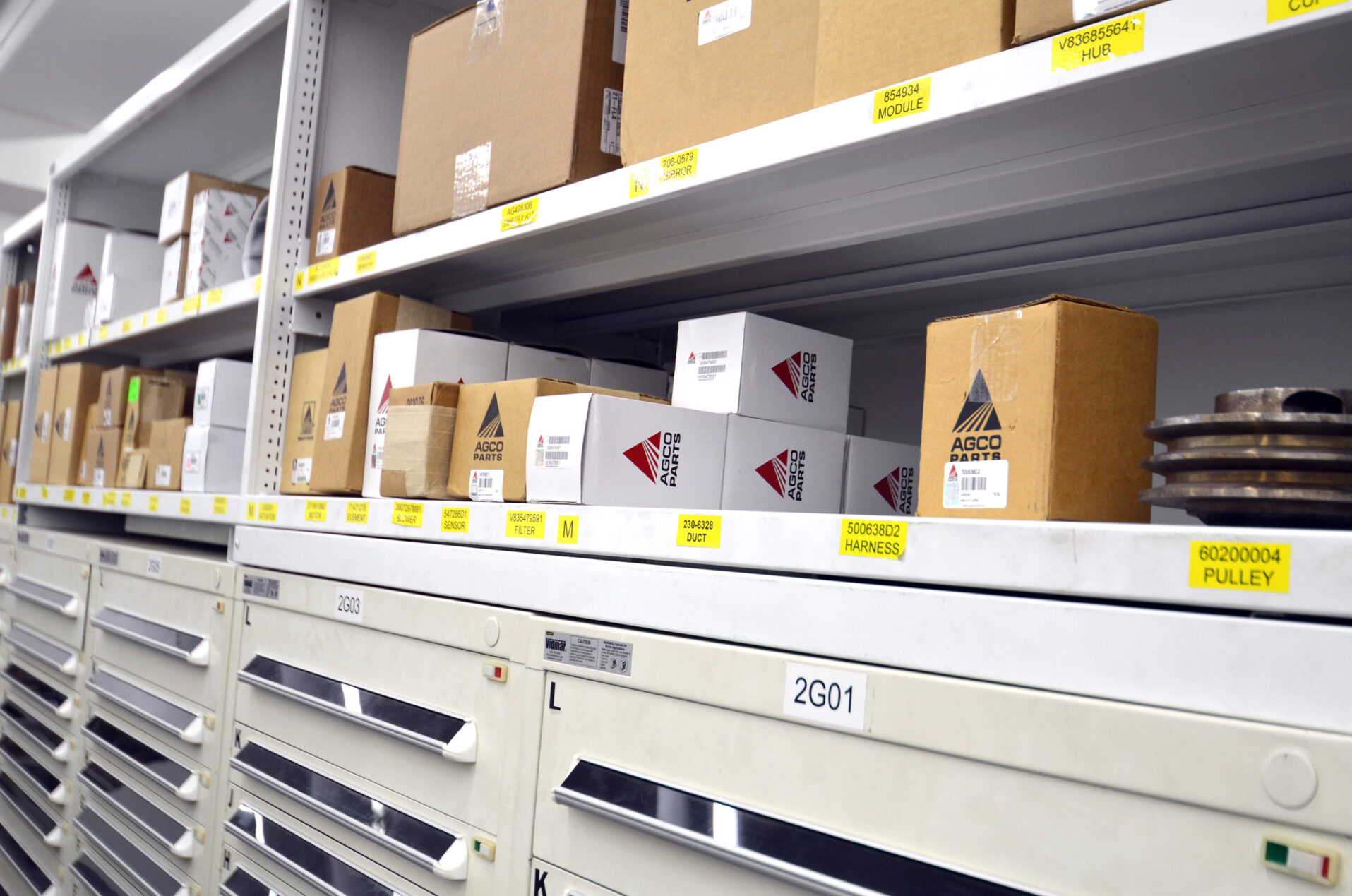 Shelves of AGCO parts in boxes