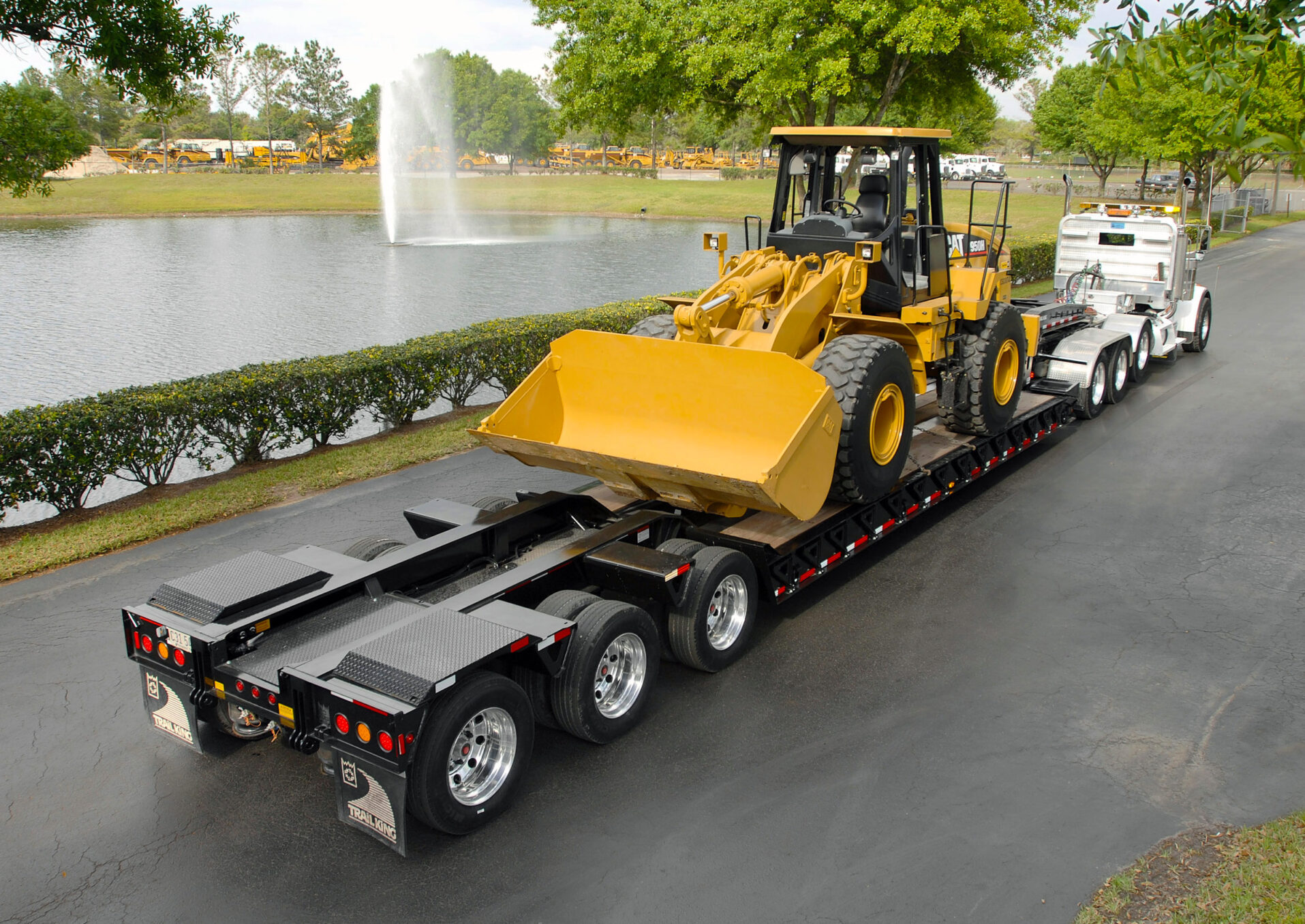 Truck loaded with Cat equipment