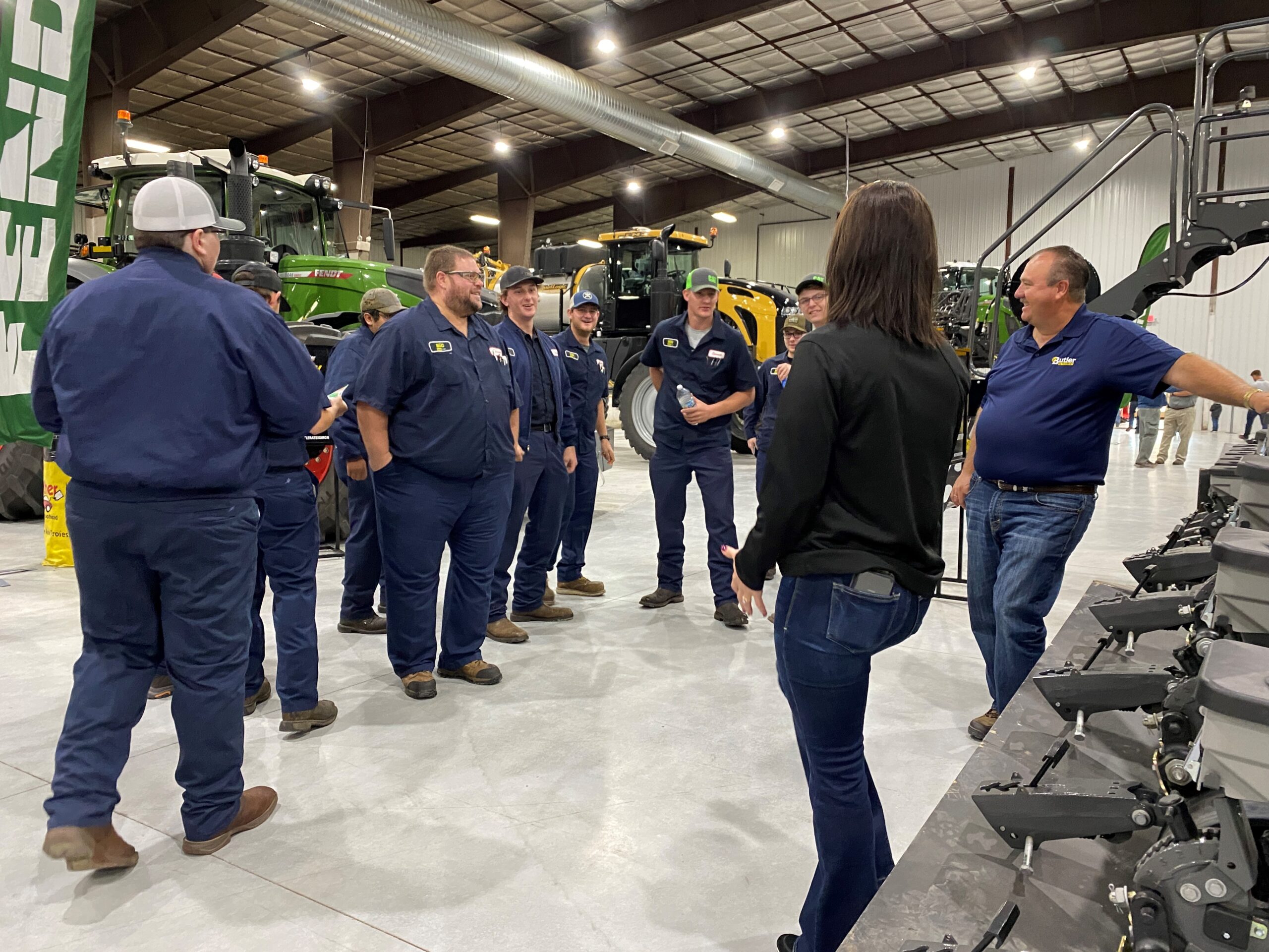 Group of Think Big participants in a warehouse.