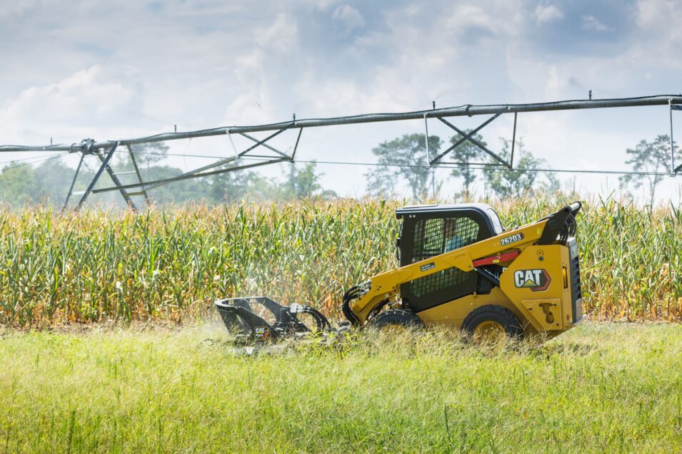 Caterpillar compact equipment working at a farm